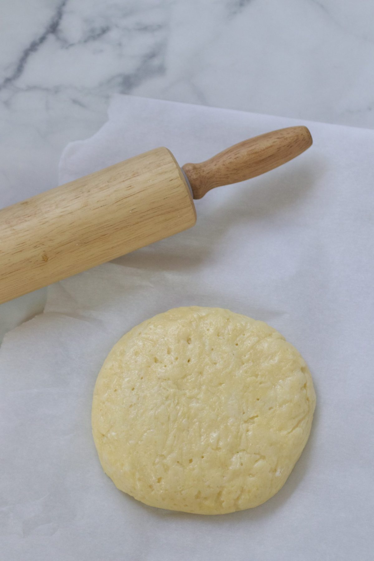 Keto All purpose dough and a rolling pin.