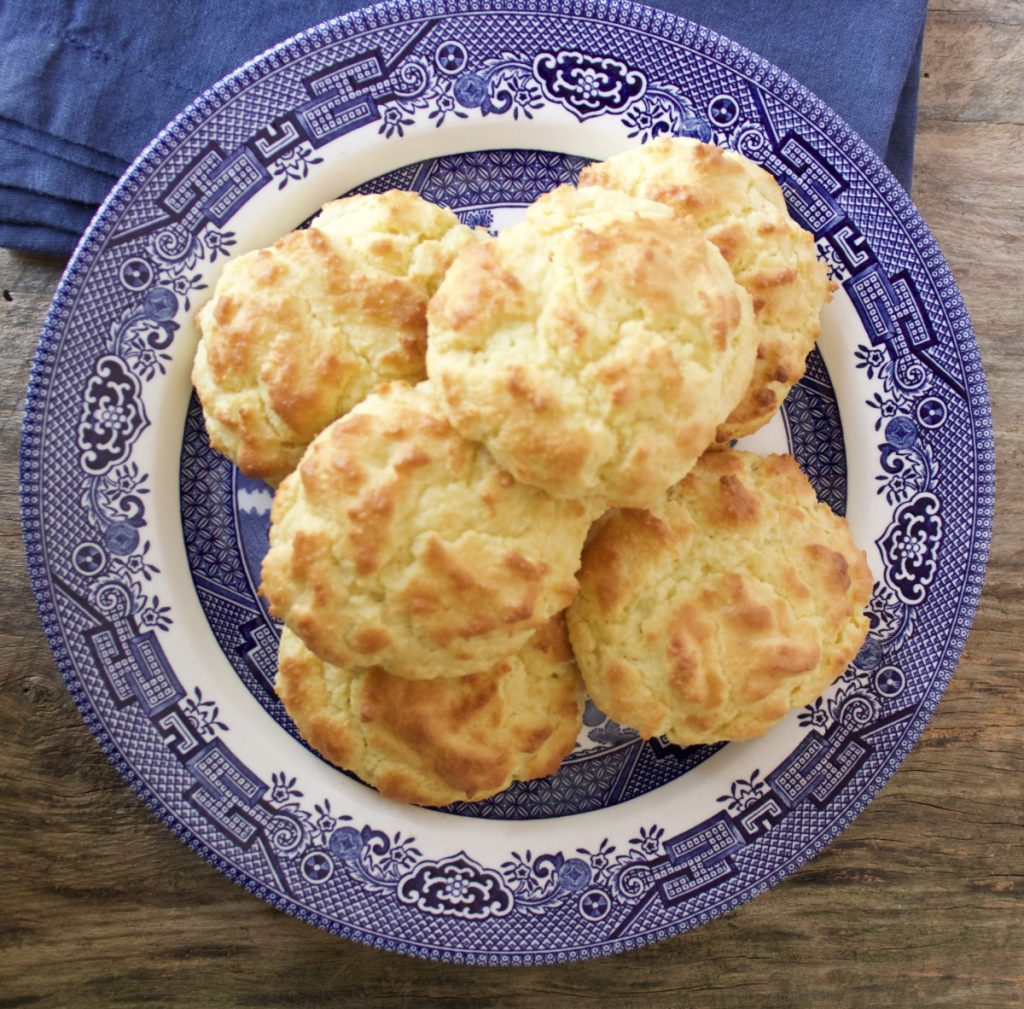 Drop biscuits on a blue and white plate.