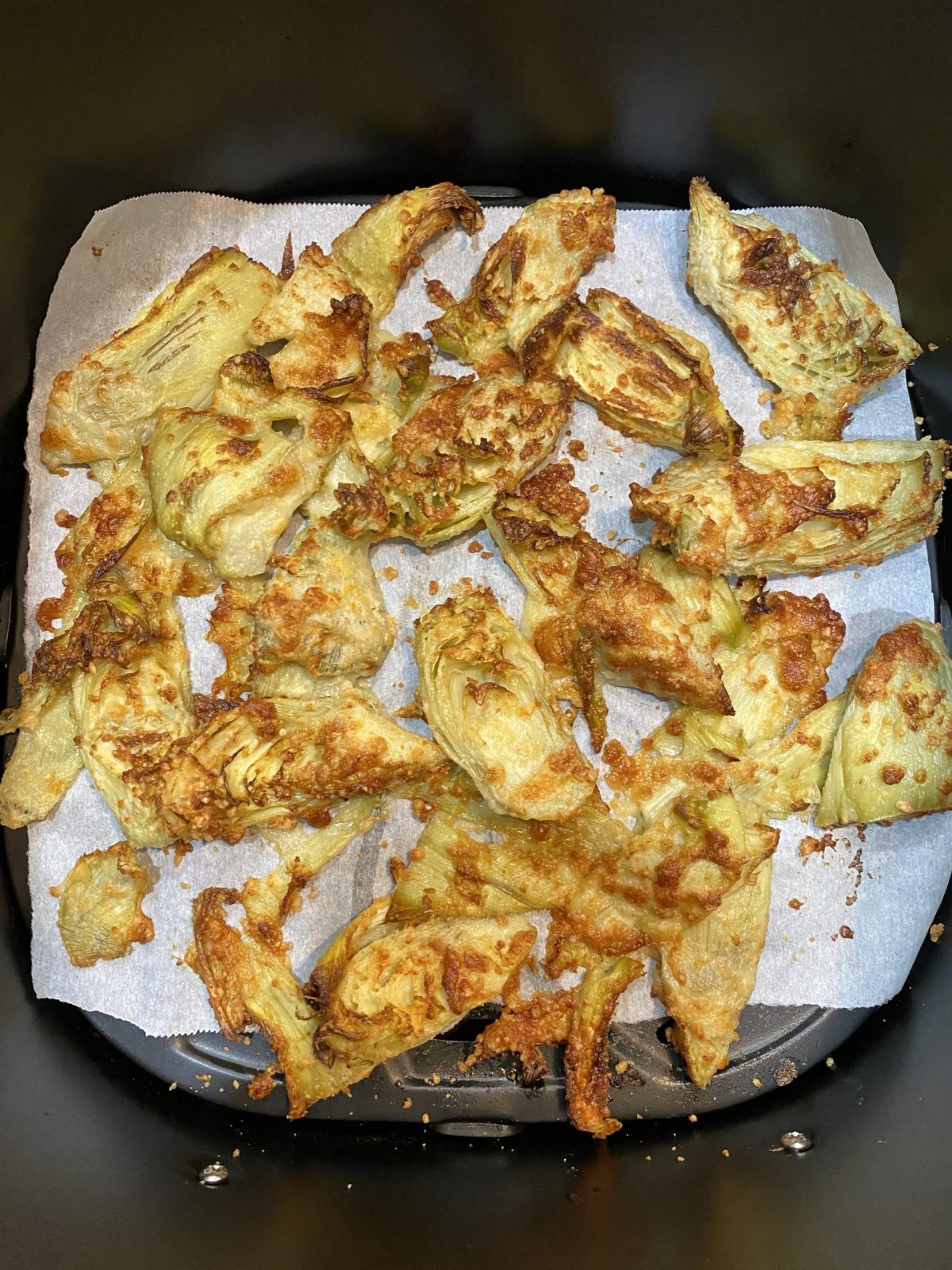 finished air fried artichokes in basket.  