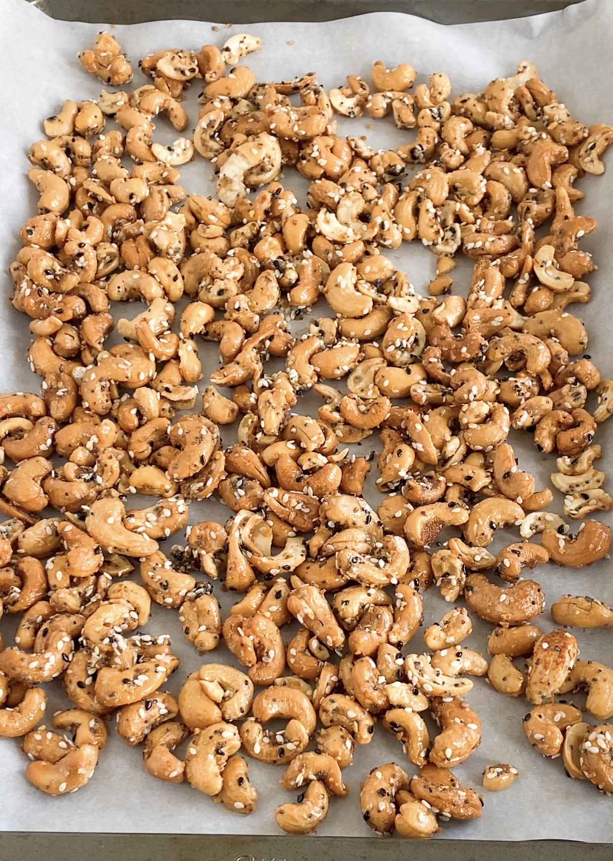 Everything bagel cashews on sheet pan.