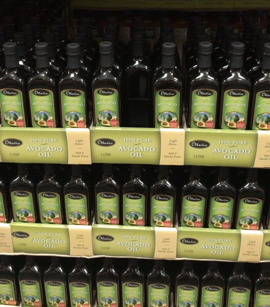 avocado oil bottles on a shelf.