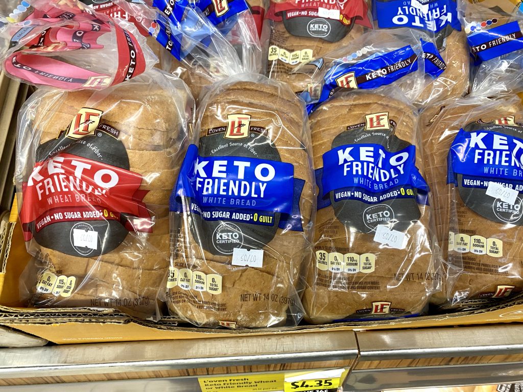 Packages of keto bread on the store shelf.