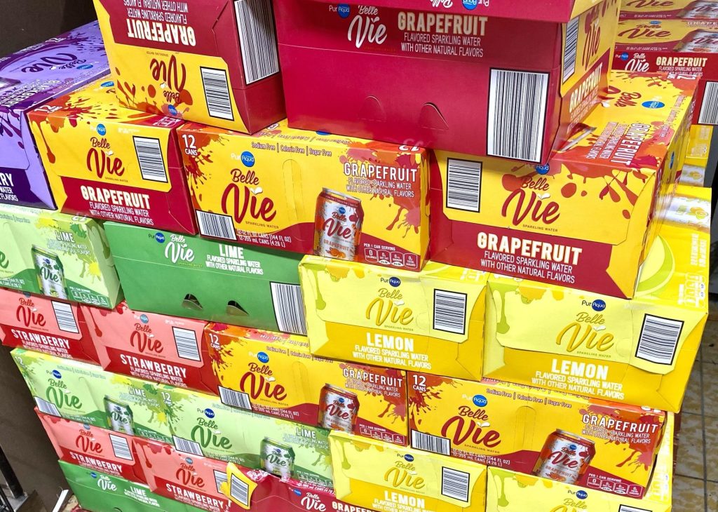 Stacks of boxes of sparkling water at aldi.