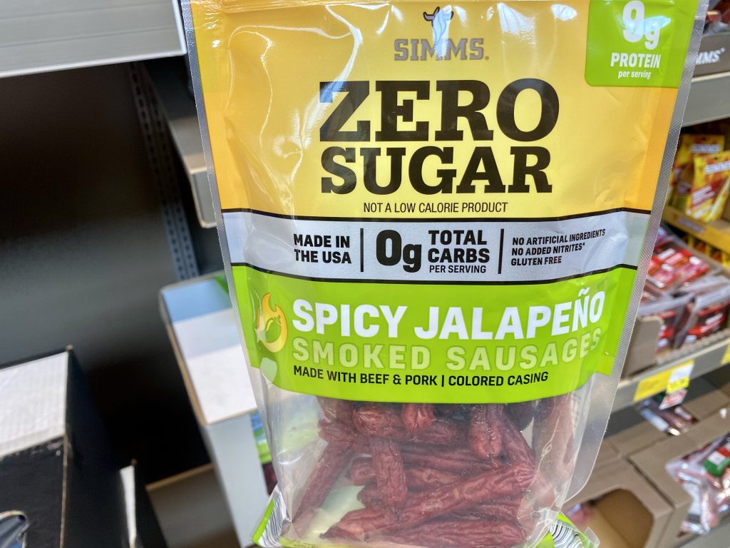 zero sugar beef sticks on grocery shelf.