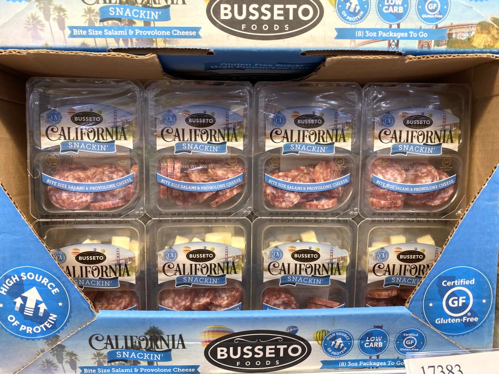 salami and cheese snacks on grocery store shelf.