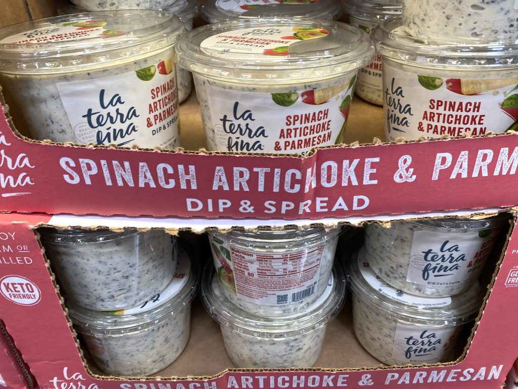 spinach artichoke dip on grocery shelf.