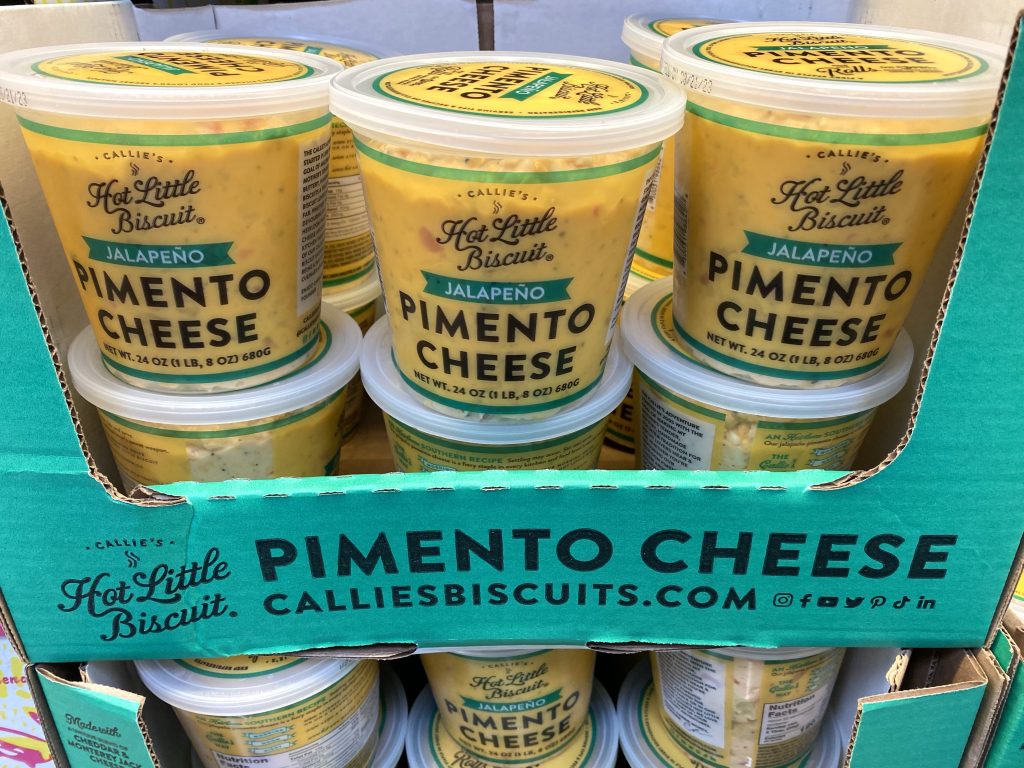 Pimento cheese on shelf at grocery.