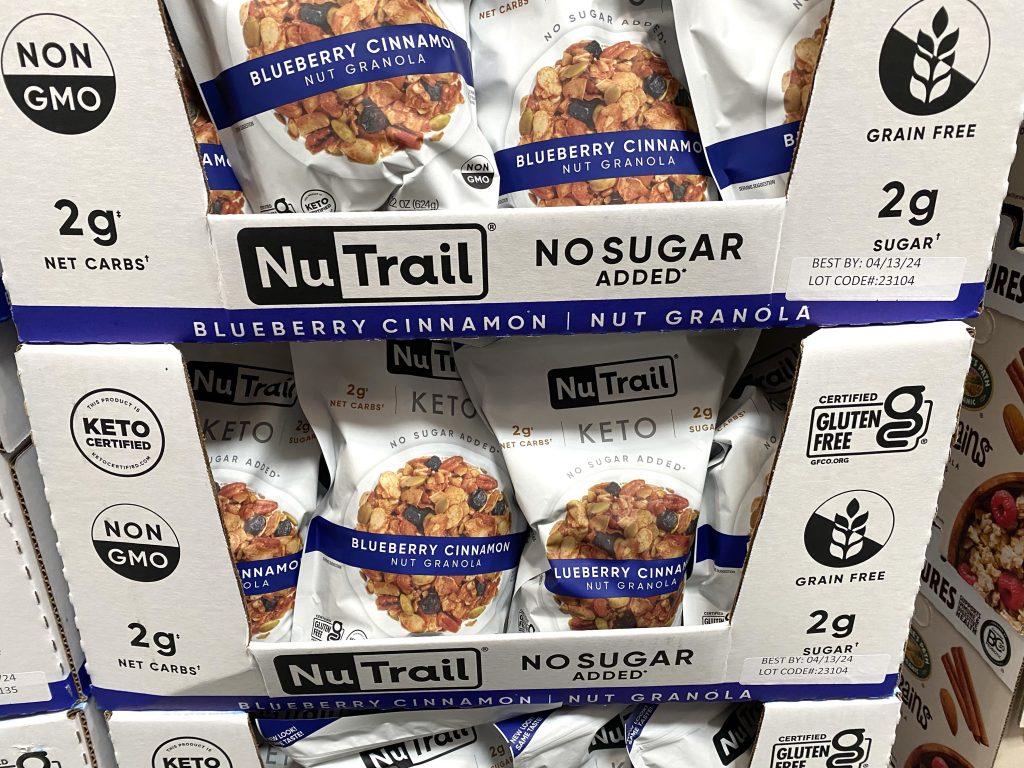 Keto Granola Cereal on grocery shelf.