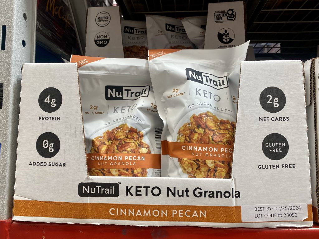 Packages of keto cereal on grocery shelf.