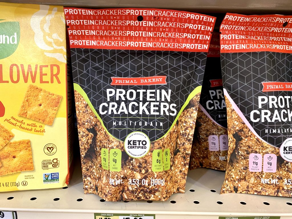 Protein crackers on store shelf.