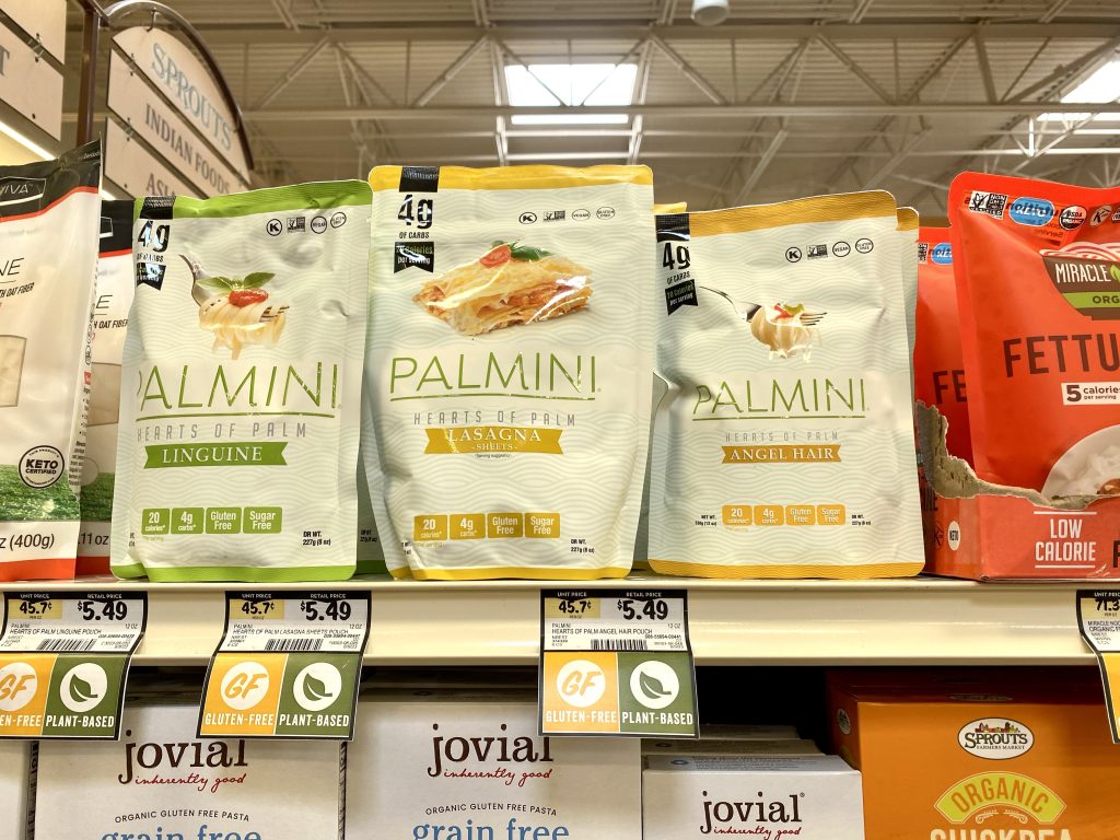 palmini hearts of palm pasta in package on store shelf.