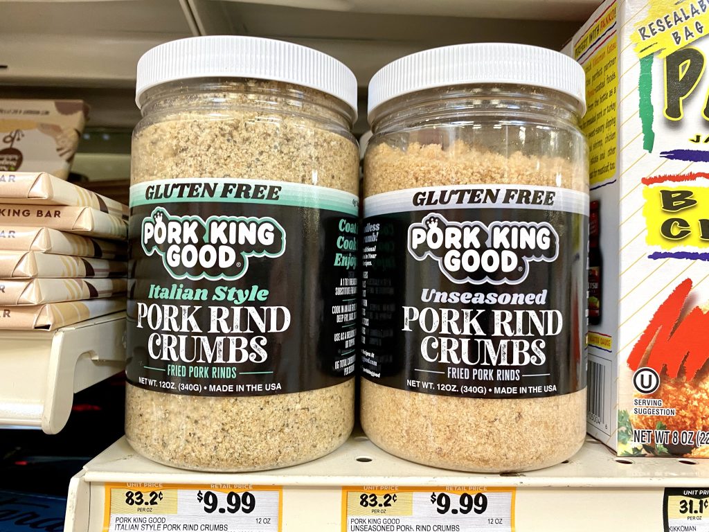 Packagres of Pork rind crumbs on store shelf.