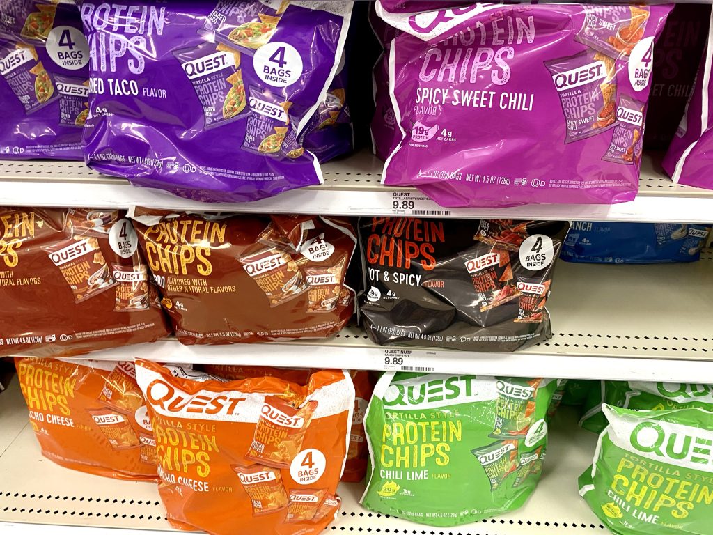 Low carb tortilla protein chips on store shelf.