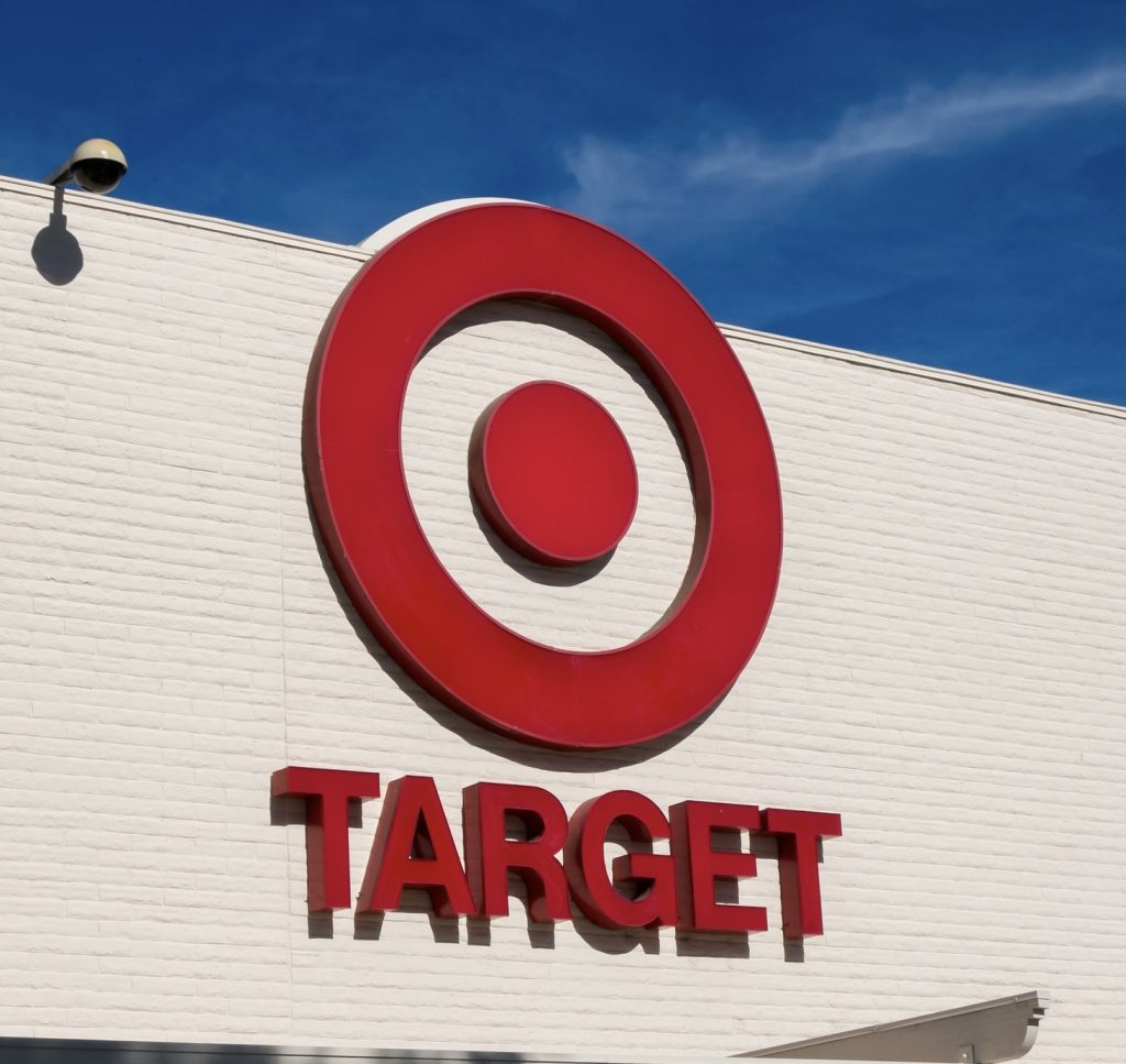 The Sign and bullseye on the front of the Target store building.