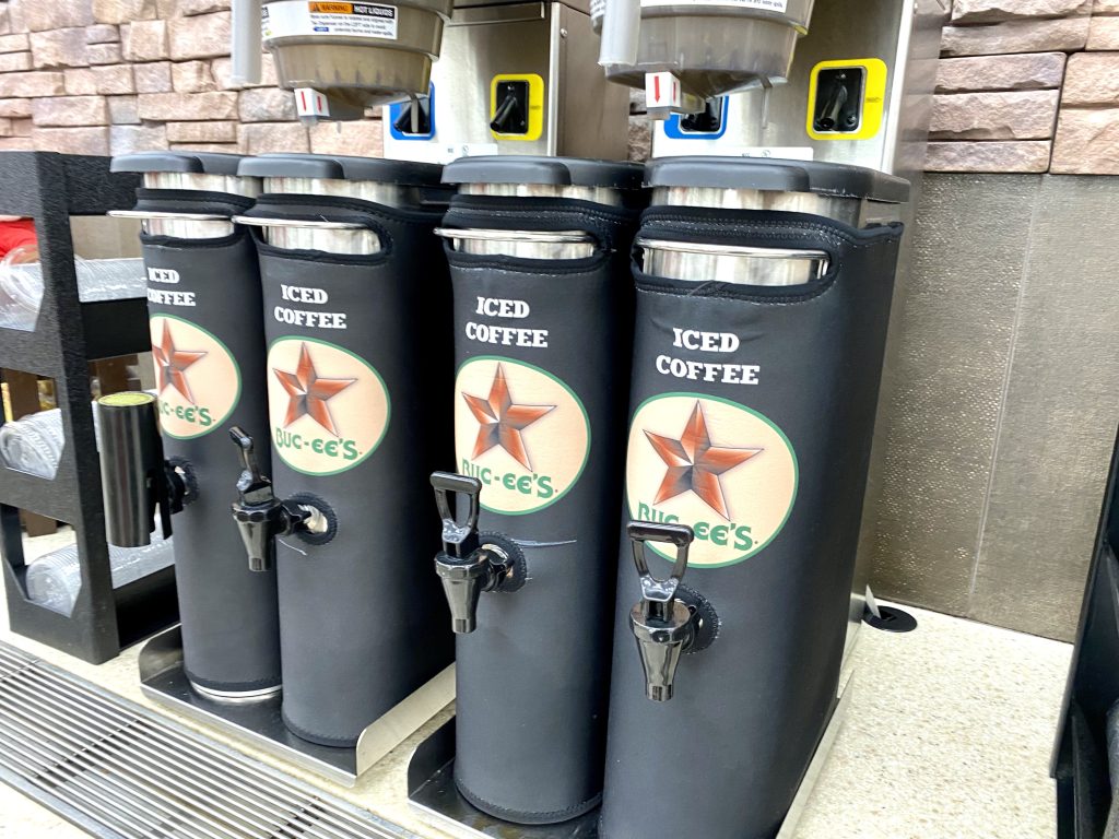 Iced coffee carafes at convenience store.