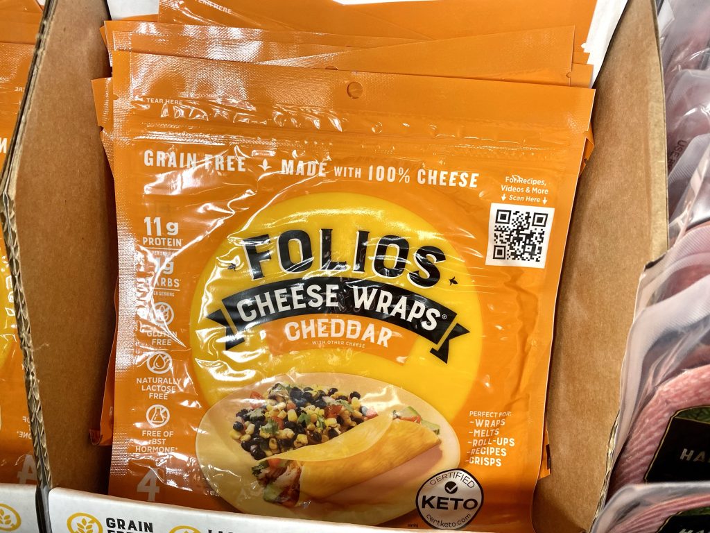 Cheese wraps on a store shelf.