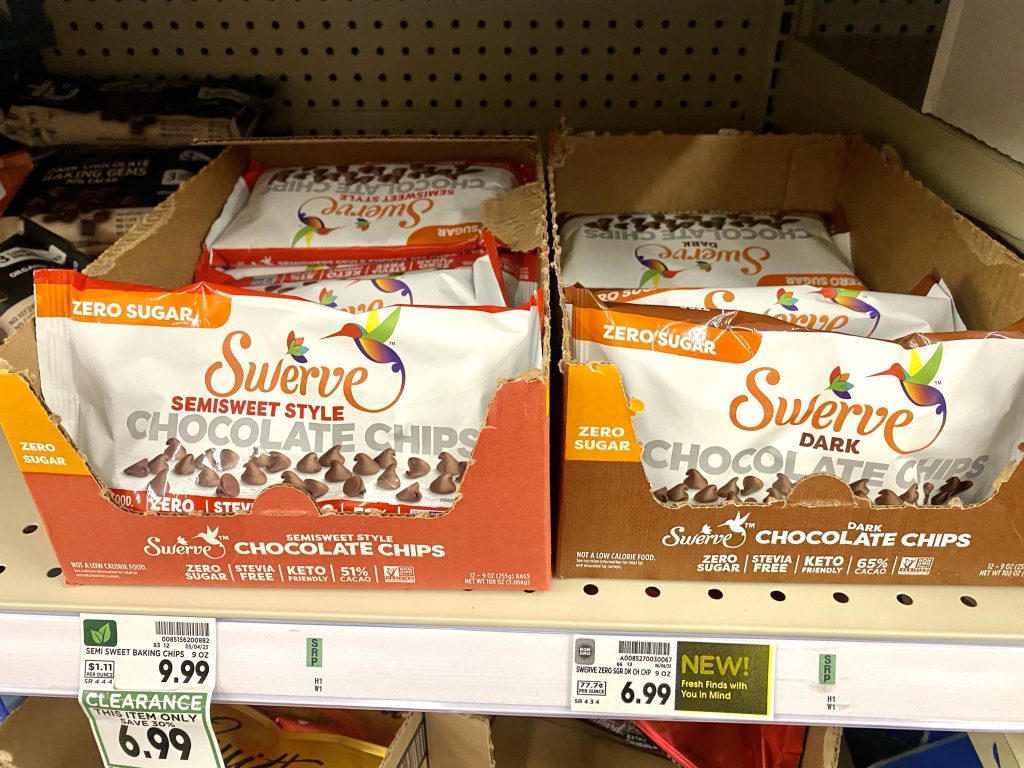 Packages of sugar free chocolate chips on store shelf.