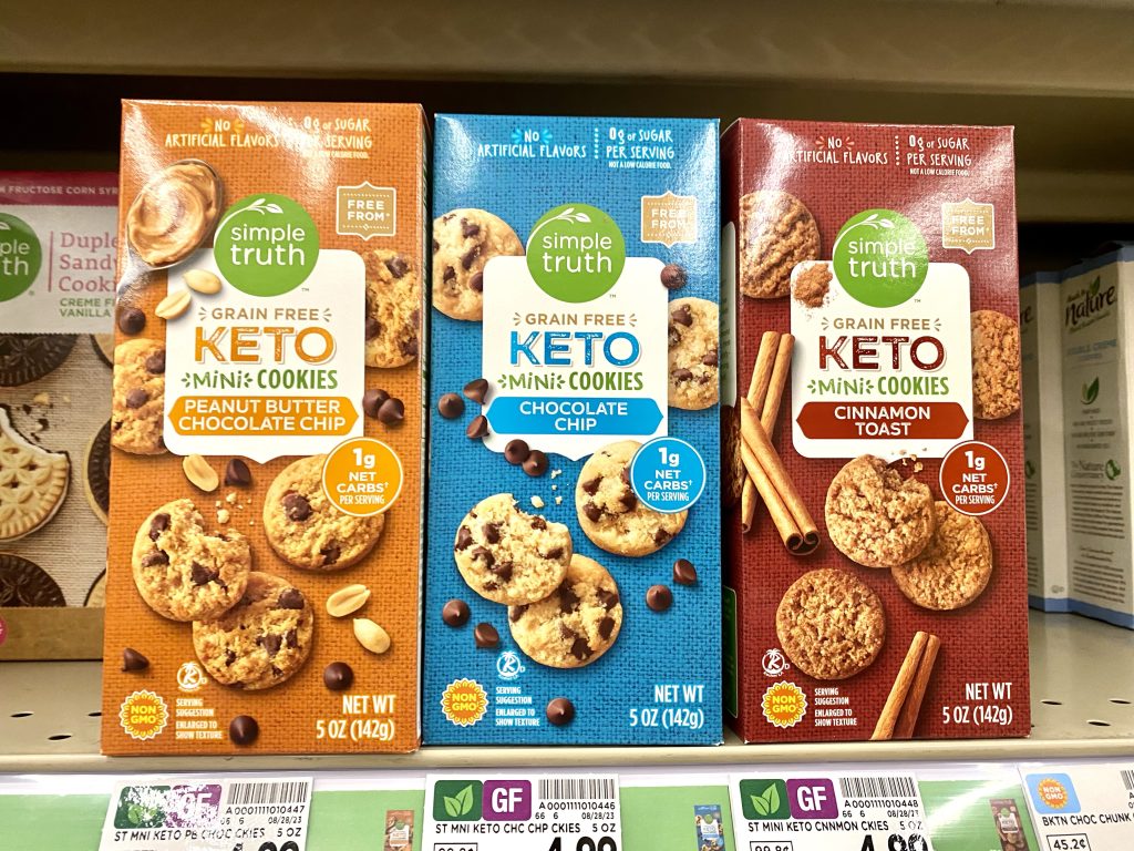 Boxes of keto mini cookies on store shelf.