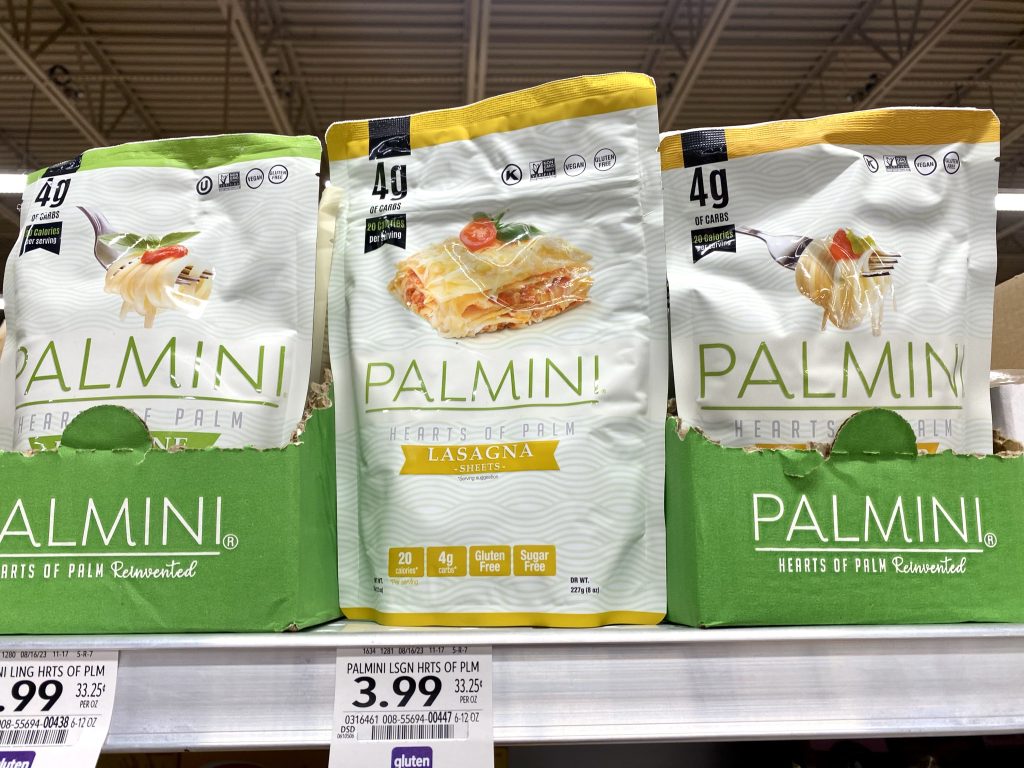 Packages of of palmini noodles on store shelf.