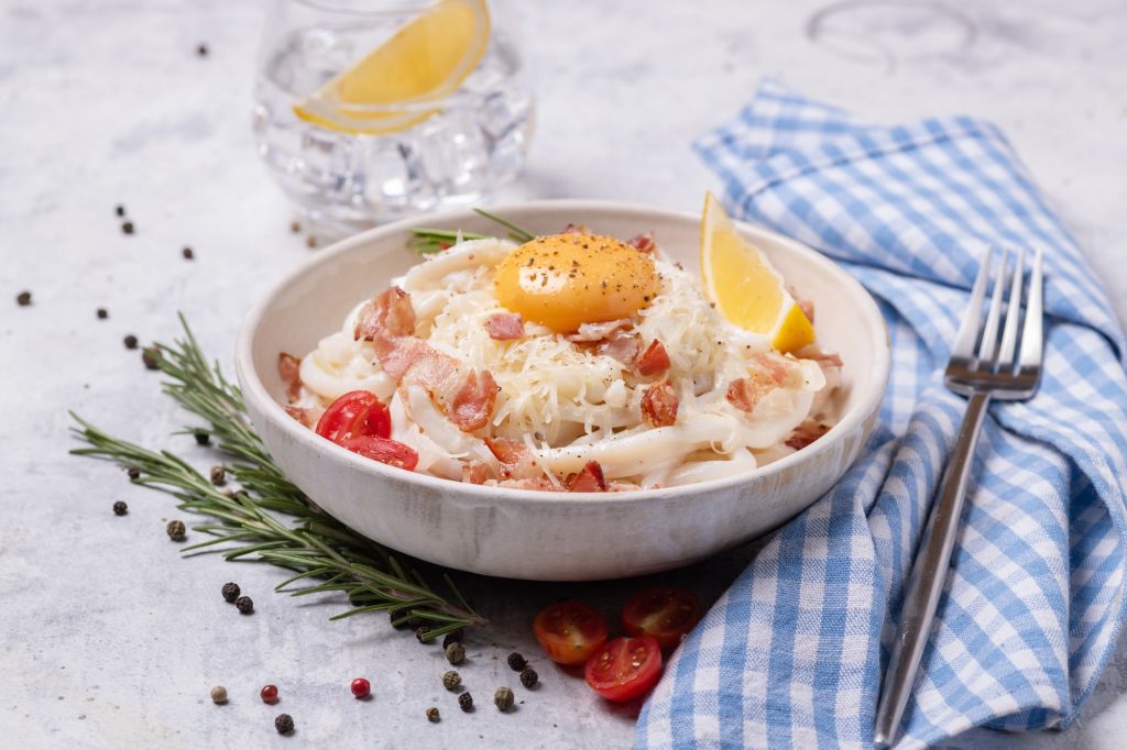 Shriatake noodles with a classic carbonara sauce and bacon.