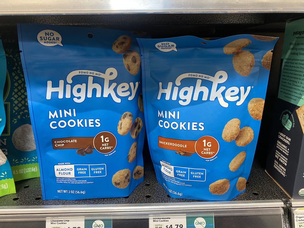 Bags of keto High Key Cookies on the shelf at the grocery.
