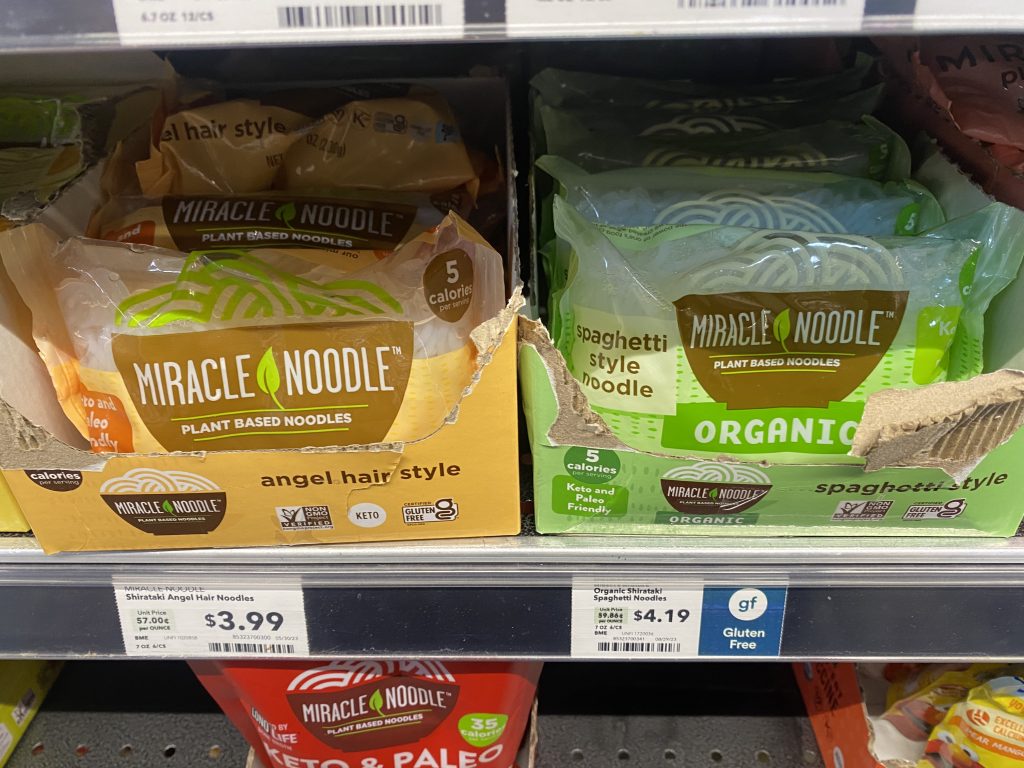 Packages of miracle noodles on the grocery shelf.