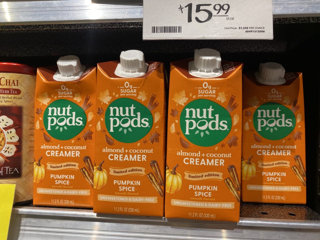 Boxes of Nut Pods creamers on the shelf at the grocery.