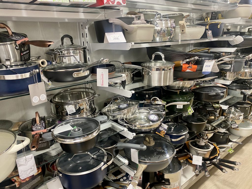A store isle filled with pots and pans.