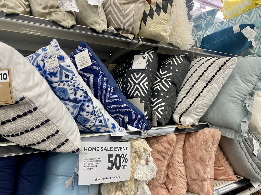 Throw pillows on store shelf.