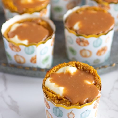 Pumpkin cream cheese muffins with salted caramel topping.