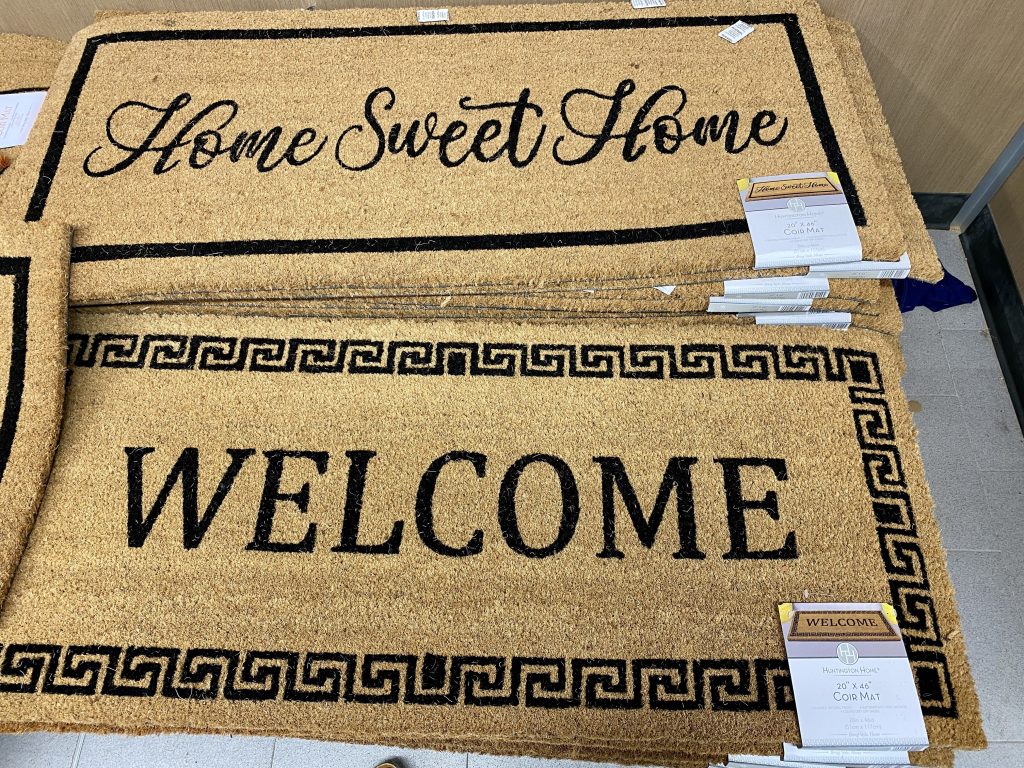 large welcome mats at the grocery store.