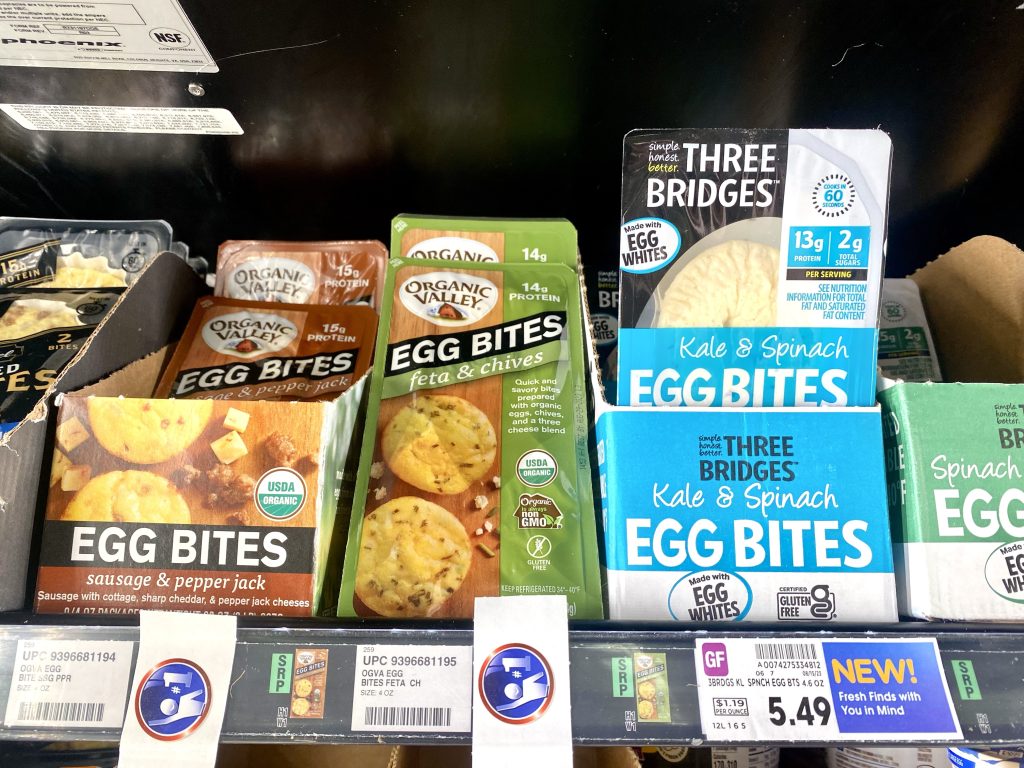 variety of flavors of egg bites at grocery.