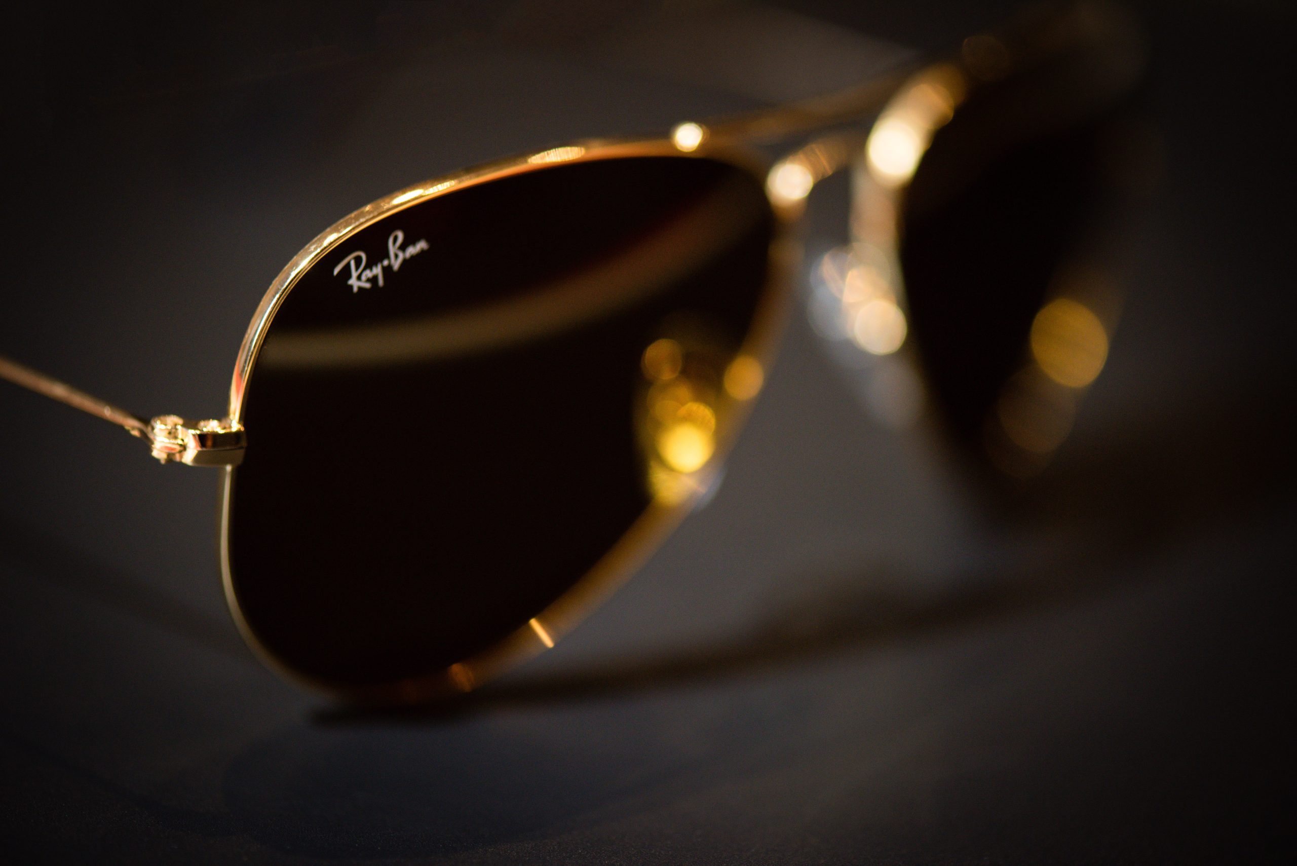 a pair of rayban aviator sunglasses.