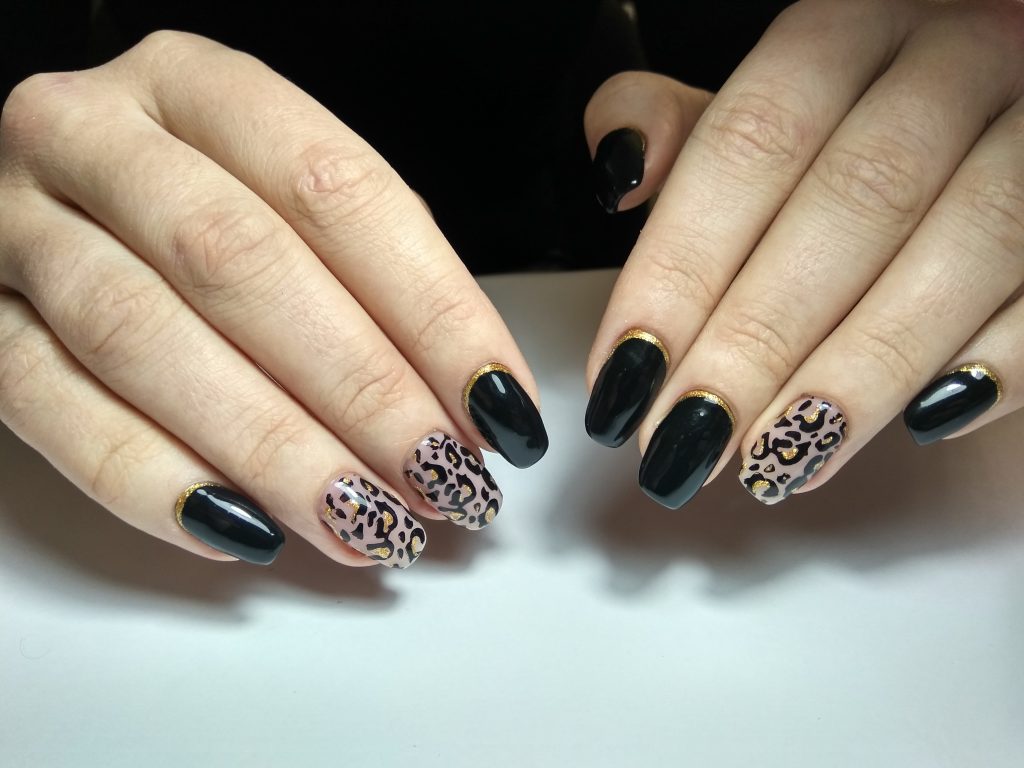 Leopard designed nails.
