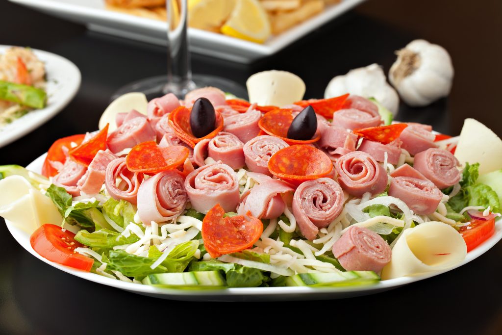 Antipasto salad, meats and cheeses.