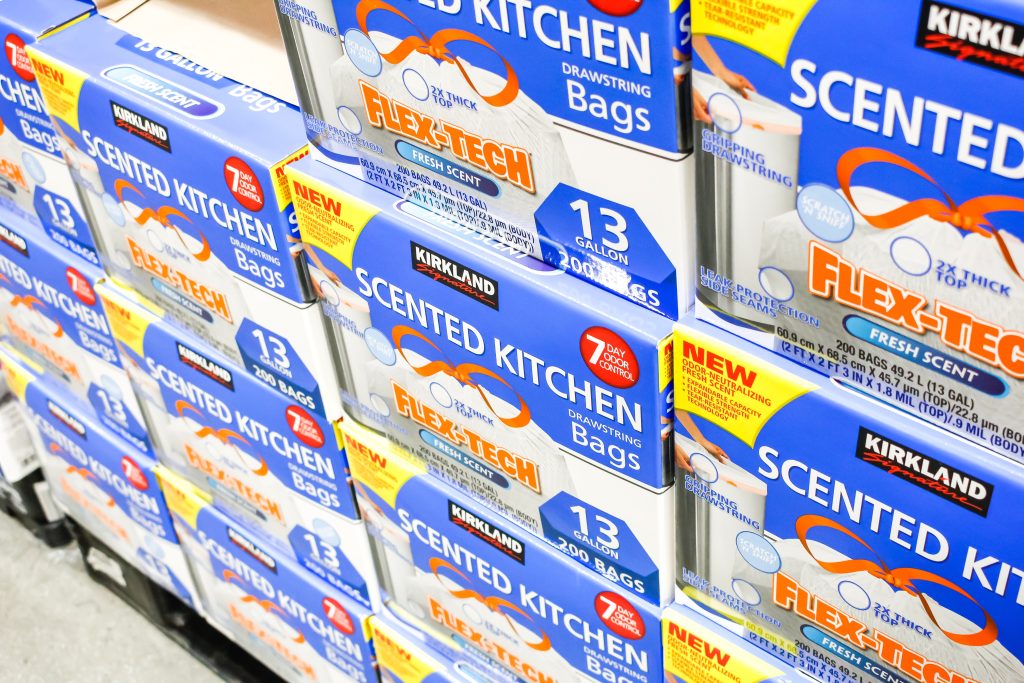 Boxes of trash bags at grocery store.