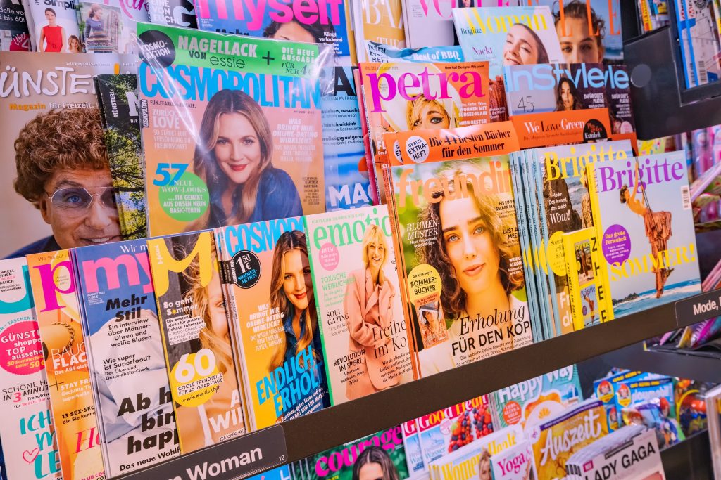 a large rack of magazines at the store.