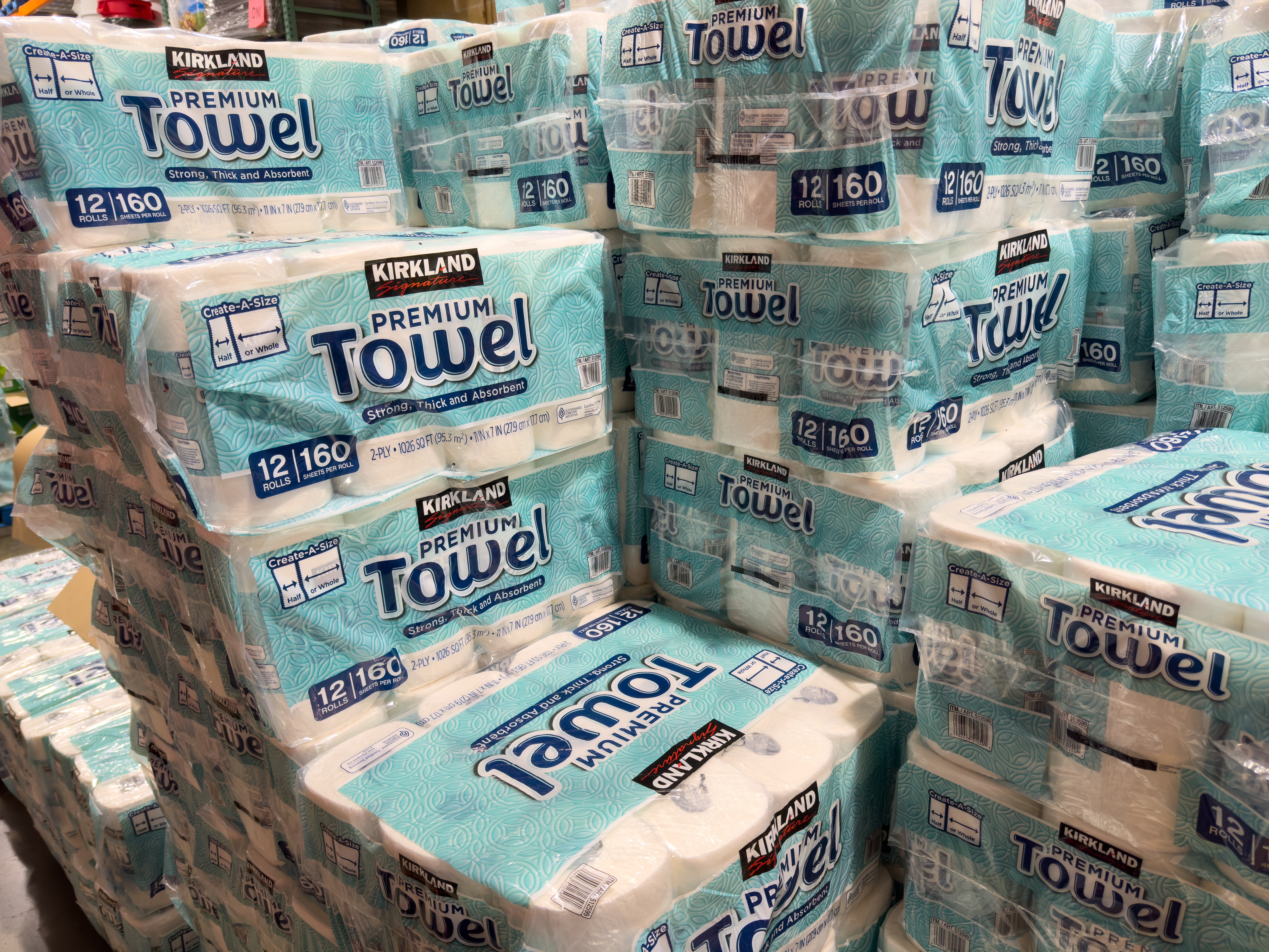 packages of paper towels at store.