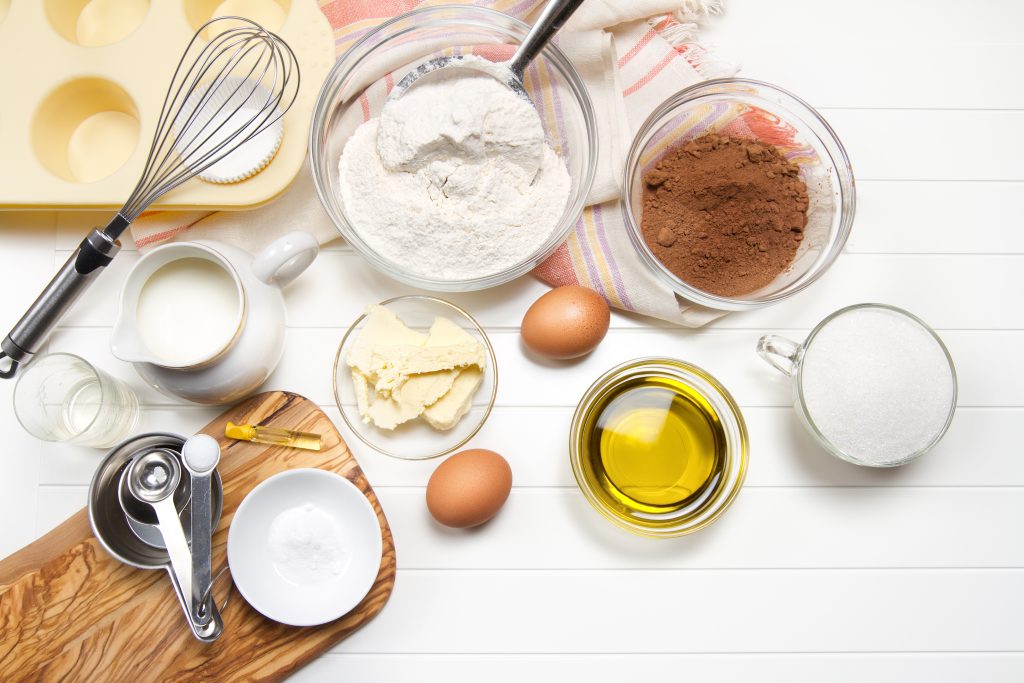 an overhead view of many cooking and baking ingredients.