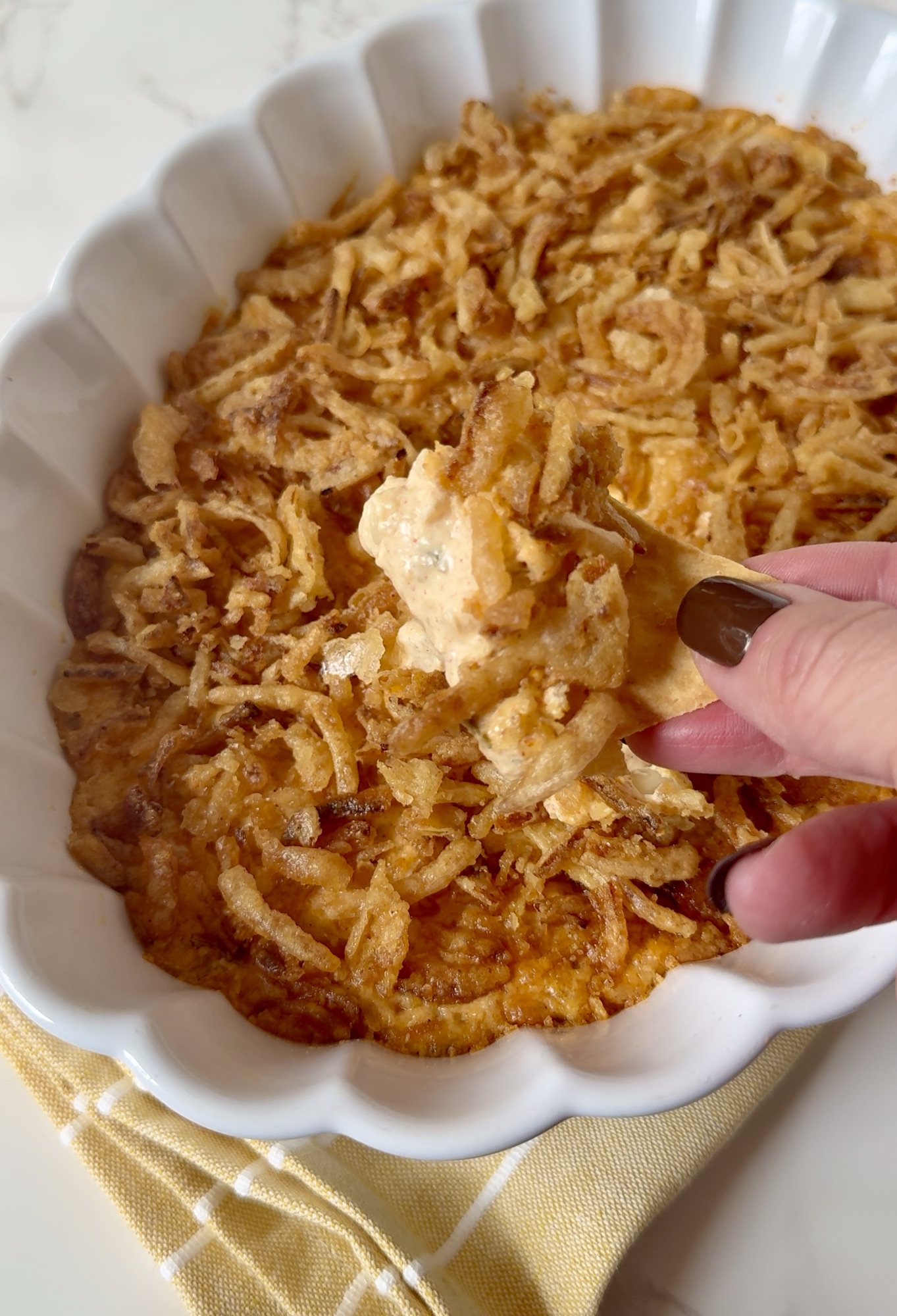 bloomin onion dip in a baking dish.